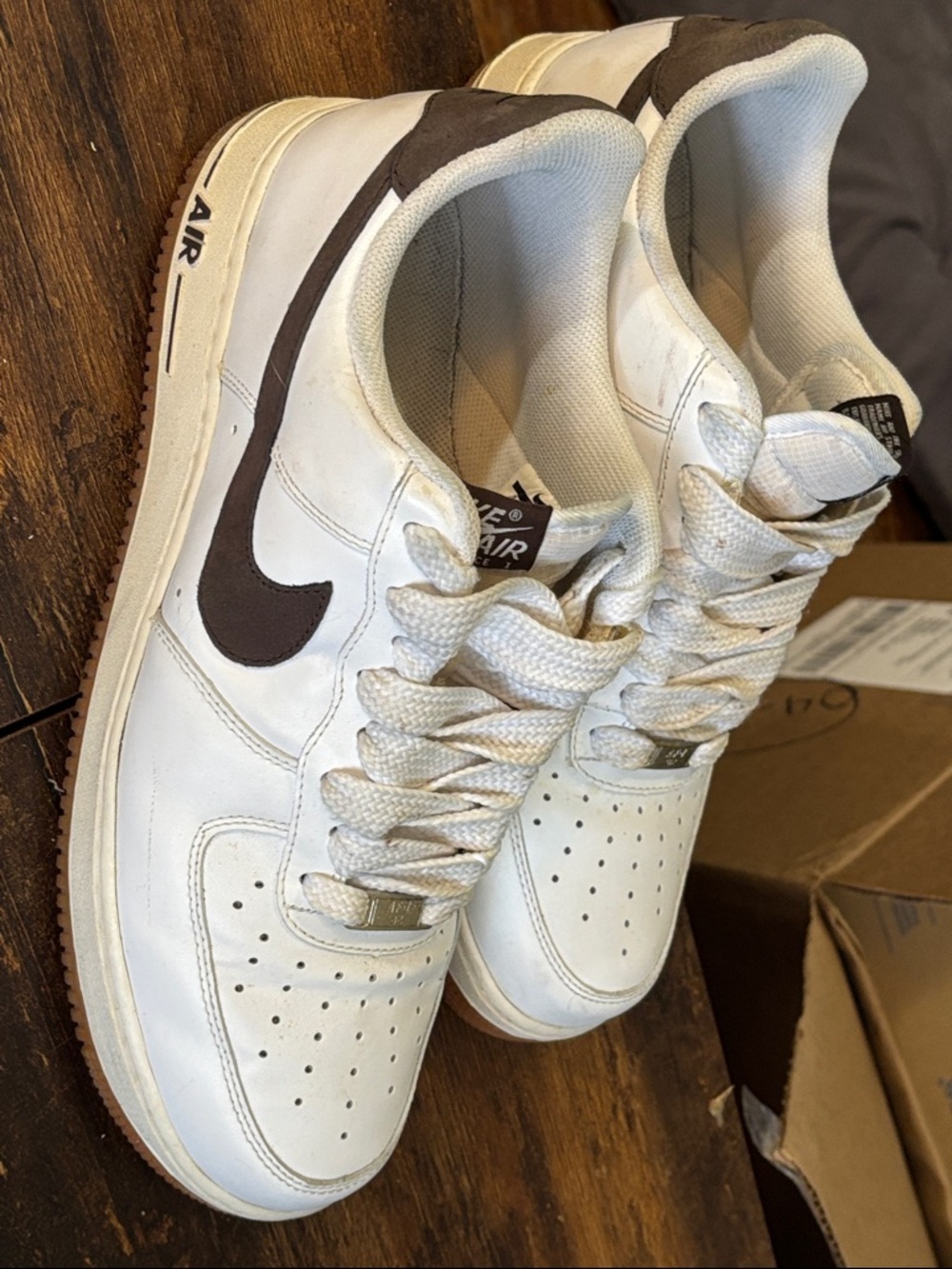Nike White Low-Top Sneakers with Brown Swoosh